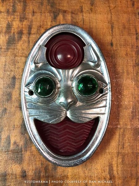 File:Cat-face-taillight-bezel.jpg